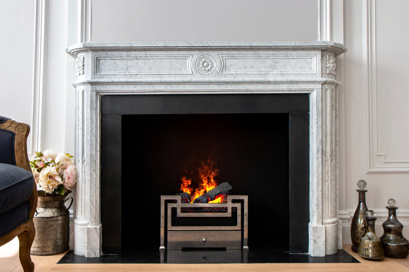 Anaya hand-carved marble fireplace mantel by Marmoso