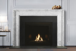 Carter hand-carved marble fireplace mantel by Marmoso