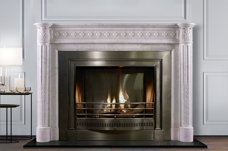 Langham hand-carved marble fireplace mantel by Marmoso